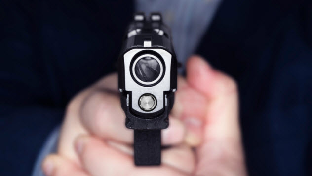 3-man-pointing-gun-459463905